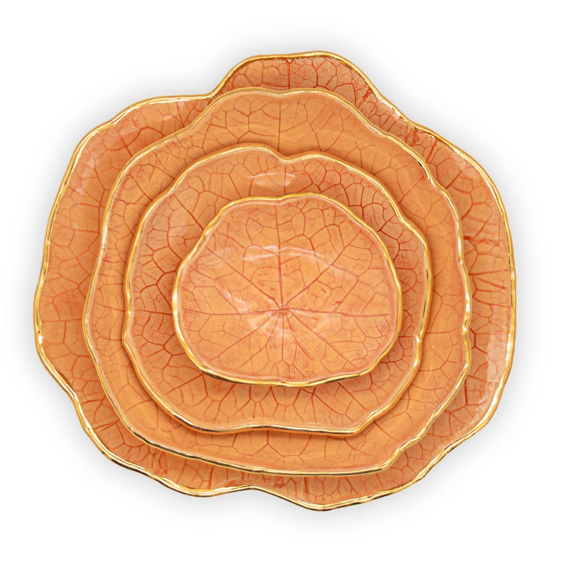 Ballad Ceramics Nasturtium Leaf Impression Dinnerware Set in orange with all sizes stacked