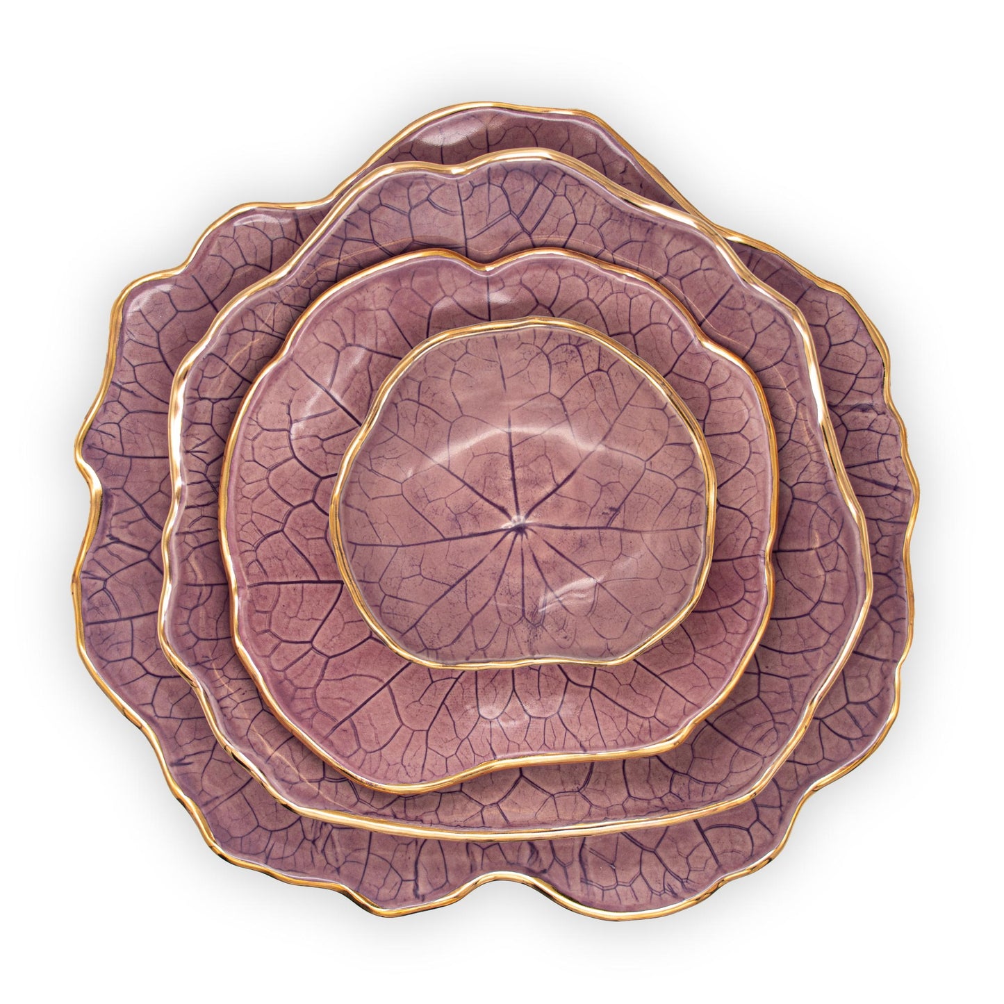 Ballad Ceramics Nasturtium Leaf Impression Dinnerware Set in purple with all sizes stacked