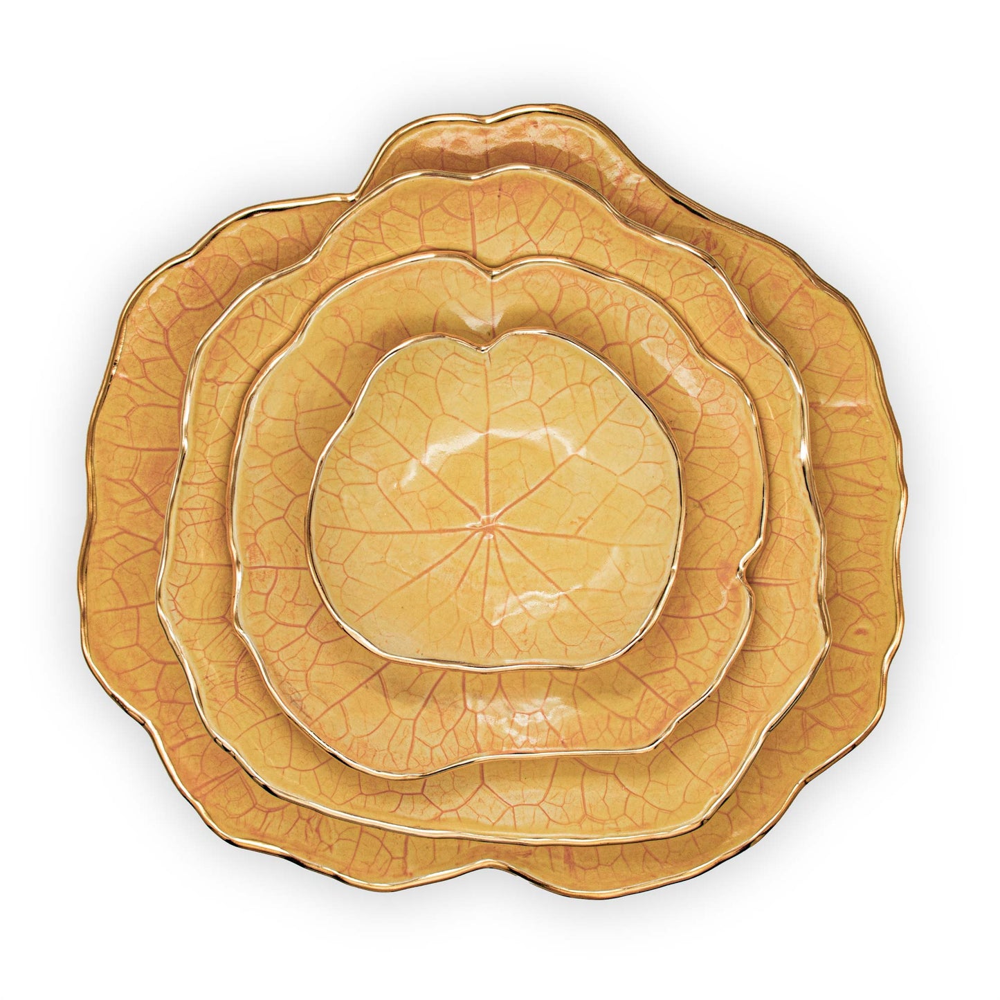 Ballad Ceramics Nasturtium Leaf Impression Dinnerware Set in yellow with all sizes stacked